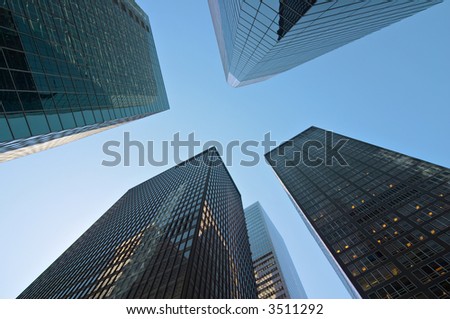 Modern tall buildings seen from below. Diminishing perspective