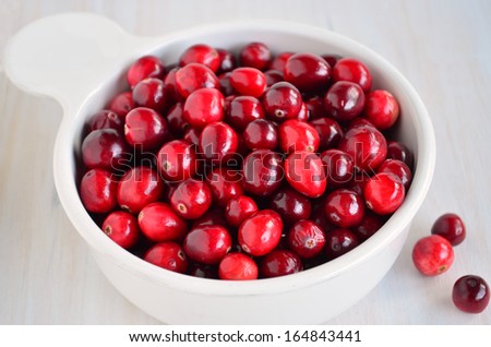 Fresh cranberries in white dish