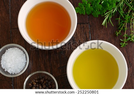 Fresh herbs, agave syrup, olive oil ,dijon mustard and rice wine vinegar with sea salt and peppercorns are the ingredients for a fresh healthy salad dressing