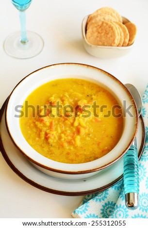 Gluten free organic curry vegetable soup in vertical format