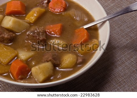 Bowl of hearty beef and vegetable stew for cold winter days