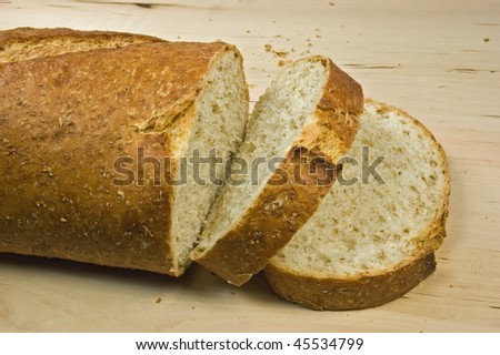 Fresh whole wheat french loaf with slices