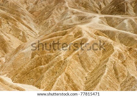 Sculptured golden badlands at Zabriskie Point, Death Valley, California