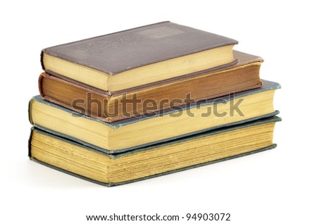 Stack of old books isolated on white background in horizonta format with room for copy