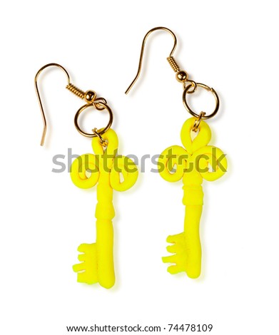 Earrings keys. The product of the plastic clay. Isolated on white background