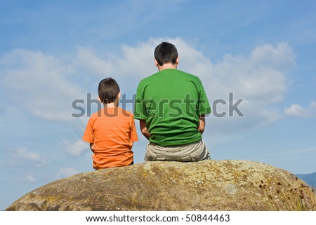 Father giving some advices to his son - the big talk concept