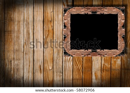 Empty frame on old wood texture
