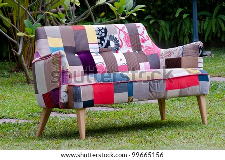 colorful sofa in a green garden