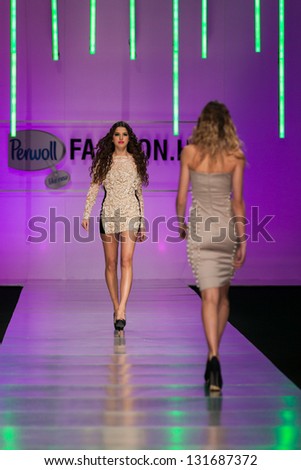 ZAGREB, CROATIA - MARCH 15: Fashion model on catwalk wearing clothes designed by  Martina Felja on the \'Fashion.hr\' show on March 15, 2013 in Zagreb, Croatia.