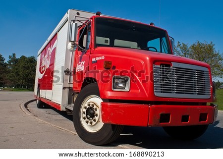 TORONTO, CANADA - MAY 5, 2007: Coca Cola delivery truck parked in front of Toronto Zoo. The Coca-Cola Company is American multinational beverage corporation producing nonalcoholic beverages.