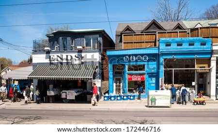 TORONTO, CANADA - MAY 4, 2007: Houses on Queens Street East, a district in Toronto, Ontario, also known as The Beaches, a popular tourist destination.