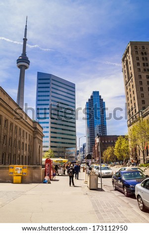 TORONTO, CANADA - MAY 7, 2007: Buildings in downtown Toronto, with CN Tower. Toronto is financial capital of Canada with 5 largest financial institutions of Canada situated in Financial District.