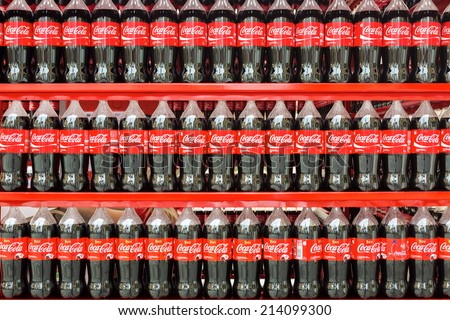 VARAZDIN, CROATIA - AUGUST 31, 2014: Plastic bottles of Coca Cola on display on Coca Cola stand during Varazdin Spanirfest festival. Coca Cola Company is leading soda drinks manufacturer in the world.