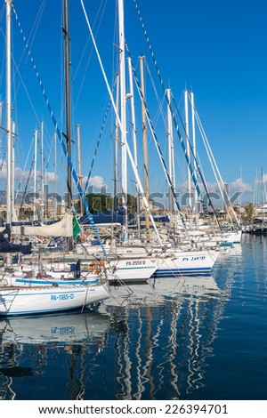 PALERMO, ITALY - OCTOBER 22, 2014: Boats and yachts parked in old port in Palermo, in La Cala bay. Palermo is located in the northwest of the island of Sicily, right by the Gulf of Palermo.