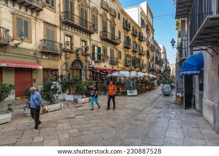 PALERMO, ITALY - OCTOBER 21, 2014: Tourists and residents on Via Bottai in Palermo. Palermo is capital of both the autonomous region of Sicily and the Province of Palermo.