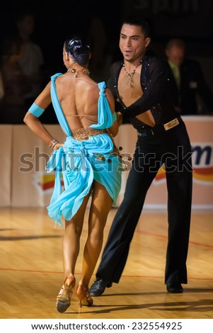 ZAGREB, CROATIA - OCTOBER 26, 2008: Ballroom dancers Lenny Gouwerok and Laura Zmajkovicova, representing Netherlands, dancing latino dances and competing during DSF Open Adults dm Grand Prix 2008.