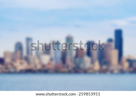 Abstract blurred background of the panoramic view of the Seattle skyline from the boat in the Puget Sound\'s Elliot Bay.