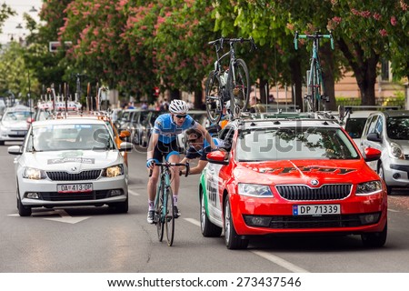 ZAGREB, CROATIA - APRIL 26, 2015: Unidentified biker getting assistance during final 5th race in Tour of Croatia, international cycling race run along the Adriatic coast, Istria and inland.