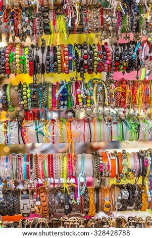 NICE, FRANCE - AUGUST 16, 2015: Handmade jewelry at the street shop in Nice. Nice is 5th most populous city in France and capital of Alpes Maritimes department.
