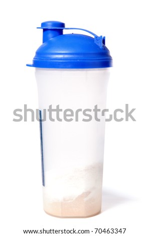 Plastic protein shaker with blue top and whey powder inside isolated on white background