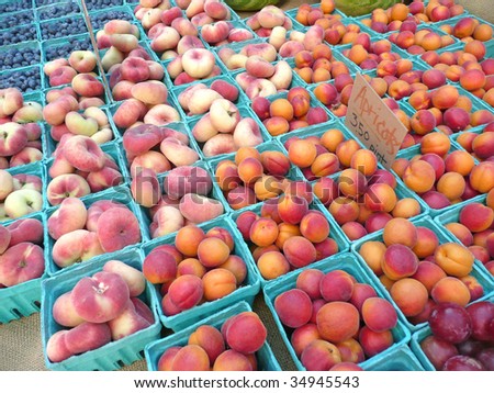 Baskets of plums and peaches