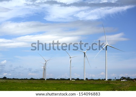 Wind turbines being constructed in a field in Panama