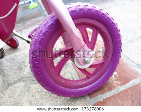 Macro shot of a toy bike front tire
