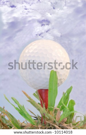 Golf ball against blue sky