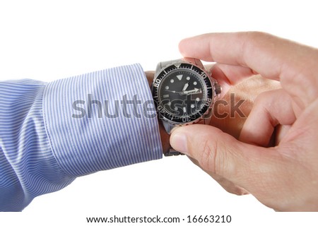 Executive hand holding a wrist watch isolated on white