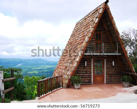 Beautiful Small A-Frame  wood cabin on a mountain top