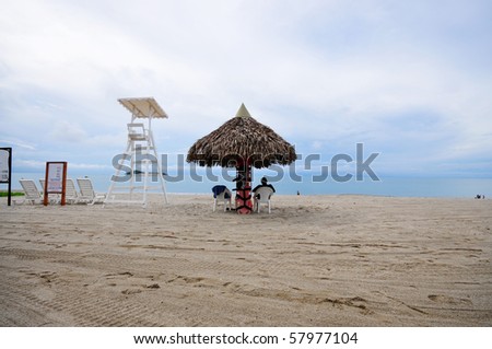 Life guard on duty on a tropical beach