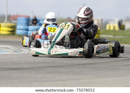 BUCHAREST, ROMANIA - APRIL 9: Alexander Prelea, number 401 competes in National Karting Championship on April 9, 2011 in Bucharest, Romania.