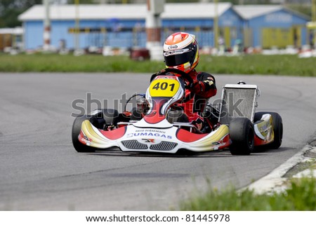 BACAU, ROMANIA - JULY 17: David Dugaesescu, number 401, competes in National Karting Championship, Round 3, on July 17, 2011 in Bacau, Romania.