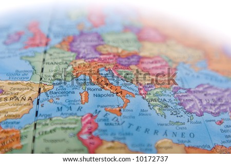 World map globe with shallow depth of field and focus on Italy