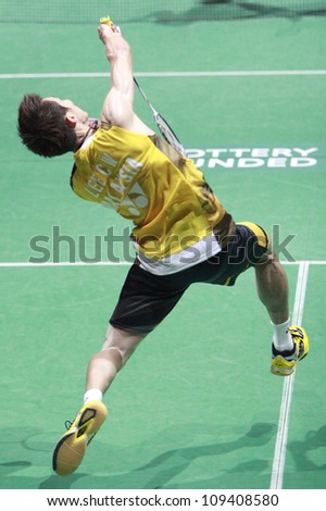 LONDON AUG 14: Lee Chong Wei of Malaysia plays a shot during the men\'s singles final against China\'s Lin Dan at the World Badminton Championships at Wembley Arena in London on August 14, 2011.