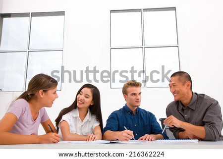 Diverse happy business people in meeting