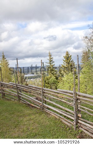 Old wooden fence at the top of a hill