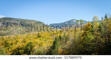 View of the Francionia Notch in fall with all the leaves turning, New Hampshire, USA