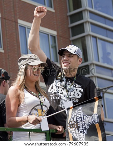 BOSTON, MA, USA - JUNE 18: Milan Lucic celebrates the Stanley cup victory at the Boston Bruins parade after winning the cup for the first time in 39 years, June 18, 2011 in Boston, MA, United States