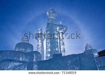 Ice Castle with beautiful rainbow as background