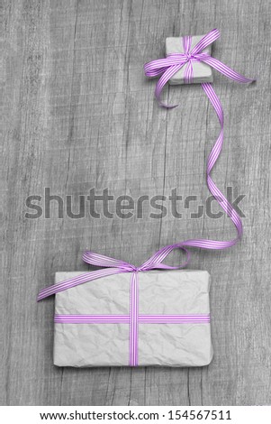 Giftboxes with purple striped ribbon for christmas, birthday or valentine