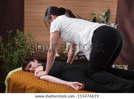 Thai woman making massage
