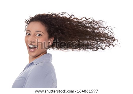 Hurry: businesswoman in a hurry but which fun - blowing hair.