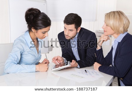 Successful business collaboration - man and two woman.