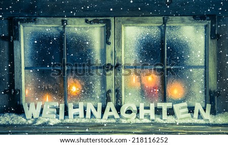 Atmospheric xmas window for a background with german text: Christmas.