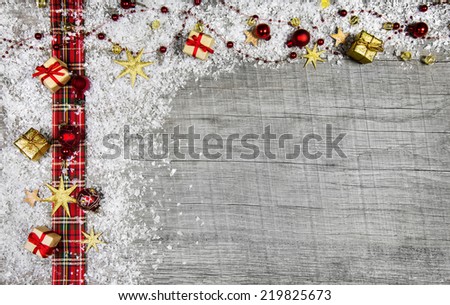 Classical wooden christmas background with red and snow for an advertising sign.
