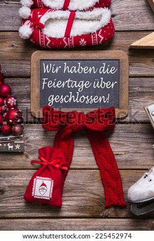 German text on a billboard: We have open on christmas holidays. Sign for customers.