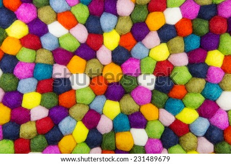 Colorful felt background for creative items.