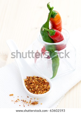 red and green chillies with chilli seeds