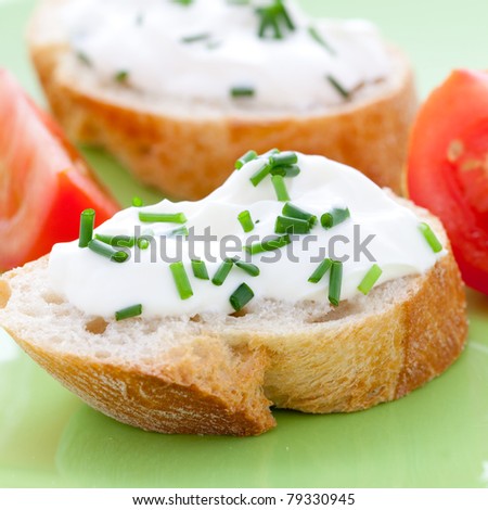 fresh cream cheese on baguette